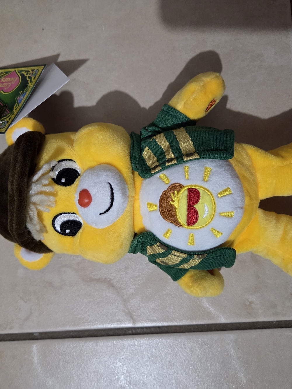 Yellow Bear Plush with Green Jacket and Sunny Emblem - Kids Stuffed Animal